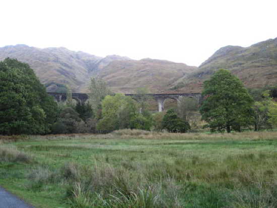 Photo of Glenfinnan viaduct, distant view with hills to the North.