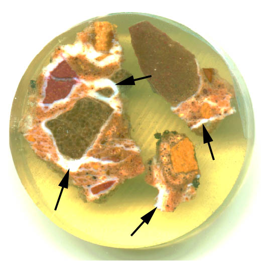 Figure 4 Thaumasite formation in concrete: polished section of degraded concrete from a highways structure in the United Kingdom.